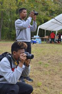 Kerisha Goode ’18 and Greg Henderson ’17 take photos to document 2016 Chessie Trail Half Marathon and 5K. – Photo courtesy of Maj. Stephanie Hodde. 